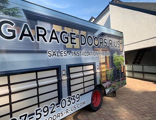 Garage Doors R Us Truck in front of garage